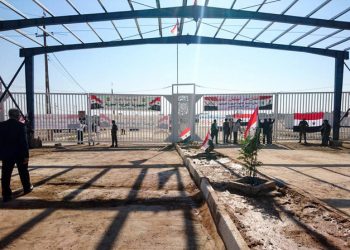 epa07882835 A handout photo made available by the official Syrian Arab News Agency (SANA) shows the border crossing between al-Qaim in Iraq and al-Bukamal in Syria after it was reopened, Syria, 30 September 2019. The crossing has been closed since 2012. According to media reports, the reopening of the crossing is seen as a significant move to boost trade and economic exchange between Iraq and Syria, and provide transport services needed by Iraqis and Syrians. The crossing was liberated from the Islamic State in November 2017. Some 800 freight trucks are reportedly expected to cross from Syria via al-Qaim crossing after its official reopening.  EPA-EFE/SANA HANDOUT  HANDOUT EDITORIAL USE ONLY/NO SALES