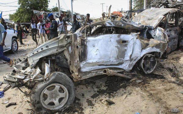 epa08092359 A view of the wreckage of a vehicle at the scene of a large explosion near a check point in Mogadishu, Somalia, 28 December 2019. A source at a hospital said that at least 25 people have been killed in what is believed to have been a car bombing. The explosion rocked an area near the junction called Ex-Control Afgoye, in a southwestern suburb of the capital Mogadishu.  EPA-EFE/SAID YUSUF WARSAME