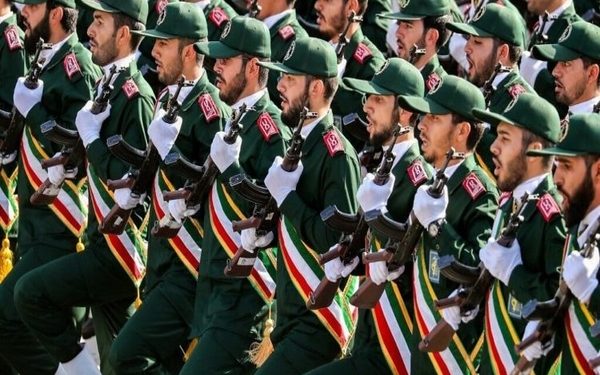 (FILES) In this file photo taken on September 22, 2018 shows members of Iran's Revolutionary Guards Corps (IRGC) marching during the annual military parade which markins the anniversary of the outbreak of the devastating 1980-1988 war with Saddam Hussein's Iraq, in the capital Tehran. - Iran's top security body called an urgent meeting on January 3, 2020 over the "martyrdom" of Quds Force commander Qasem Soleimani by the United States in Baghdad, semi-official news agency ISNA reported. The United States announced earlier that it had killed the commander of the Islamic republic's Quds Force, Qasem Soleimani, in a strike on Baghdad's international airport early on Friday. (Photo by STRINGER / AFP)