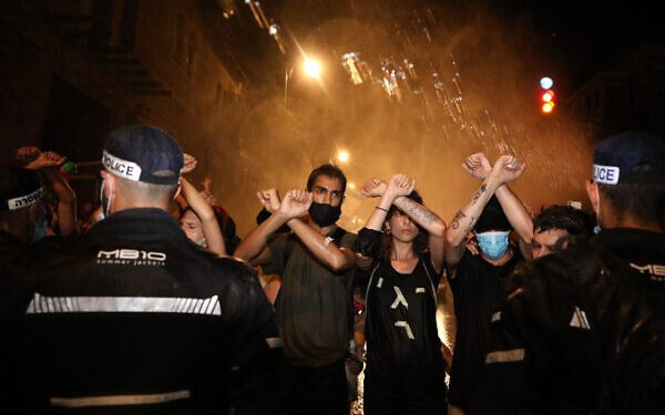 Demonstrators protest against Israeli prime minister Benjamin Netanyahu outside Prime Minister official residence in Jerusalem on July 18, 2020. Photo by Olivier Fitoussi/Flash90