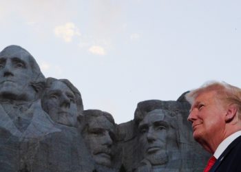 U.S. President Donald Trump is seen in front of Mt. Rushmore as he and first lady Melania Trump attend South Dakota's U.S. Independence Day Mount Rushmore fireworks celebrations at Mt. Rushmore in Keystone, South Dakota, U.S., July 3, 2020. REUTERS/Tom Brenner