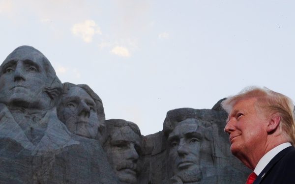 U.S. President Donald Trump is seen in front of Mt. Rushmore as he and first lady Melania Trump attend South Dakota's U.S. Independence Day Mount Rushmore fireworks celebrations at Mt. Rushmore in Keystone, South Dakota, U.S., July 3, 2020. REUTERS/Tom Brenner