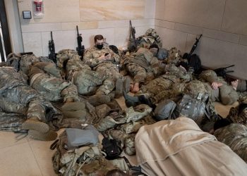 epa08935271 Hundreds of US National Guard troops rest in the Capitol Visitors Center on Capitol Hill in Washington, DC, USA, 13 January 2021. At least ten thousand troops of the National Guard will be deployed in Washington by the end of the week, with the possibility of five thousand more, to help secure the Capitol area ahead of more potentially violent unrest in the days leading up to the Inauguration of US President-elect Joe Biden. Democrats are attempting to impeach US President Donald J. Trump after he incited a mob of his supporters to riot on the US Capitol in an attempt to thwart Congress from certifying Biden's election victory.  EPA-EFE/MICHAEL REYNOLDS
