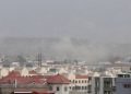 Smoke billows from the airport area after a blast outside the Hamid Karzai International Airport, in Kabul, Afghanistan, 26 August 2021. At least 13 people including children were killed in a blast outside the airport on 26 August. The blast occurred outside the Abbey Gate and follows recent security warnings of attacks ahead of the 31 August deadline for US troops withdrawal.  EPA-EFE/AKHTER GULFAM