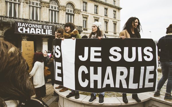 Bayonne, France - January 10, 2015: A large group of people gather in front of the city hall to protest against the terrorist attacks happened at Charlie Hebdo's headquarters and other locations at the french capital city.