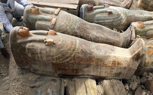 FILE - This Tuesday, Oct. 15, 2019 file photo provided by the Egyptian Ministry of Antiquities shows recently discovered ancient colored coffins with inscriptions and paintings, in the southern city of Luxor, Egypt. (Egyptian Ministry of Antiquities via AP)
