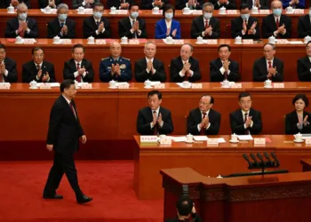 FILE PHOTO: China's President Xi Jinping prepares to deliver a speech during the closing session of the National People's Congress (NPC) at the Great Hall of the People in Beijing on March 13, 2023. NOEL CELIS/Pool via REUTERS