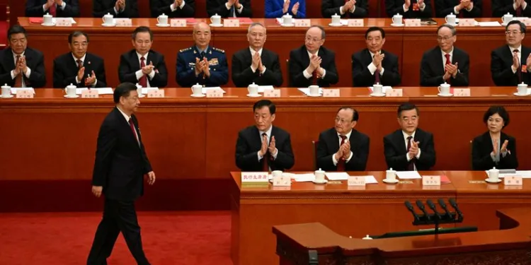 FILE PHOTO: China's President Xi Jinping prepares to deliver a speech during the closing session of the National People's Congress (NPC) at the Great Hall of the People in Beijing on March 13, 2023. NOEL CELIS/Pool via REUTERS