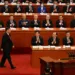 FILE PHOTO: China's President Xi Jinping prepares to deliver a speech during the closing session of the National People's Congress (NPC) at the Great Hall of the People in Beijing on March 13, 2023. NOEL CELIS/Pool via REUTERS